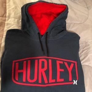 Grey and red men’s Hurley hoodie.